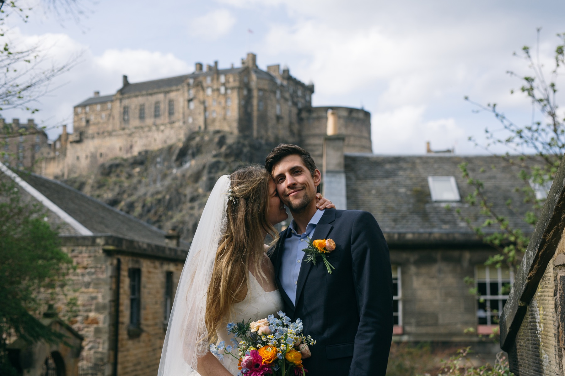 Ivan and Nandi smiling together after their ceremony